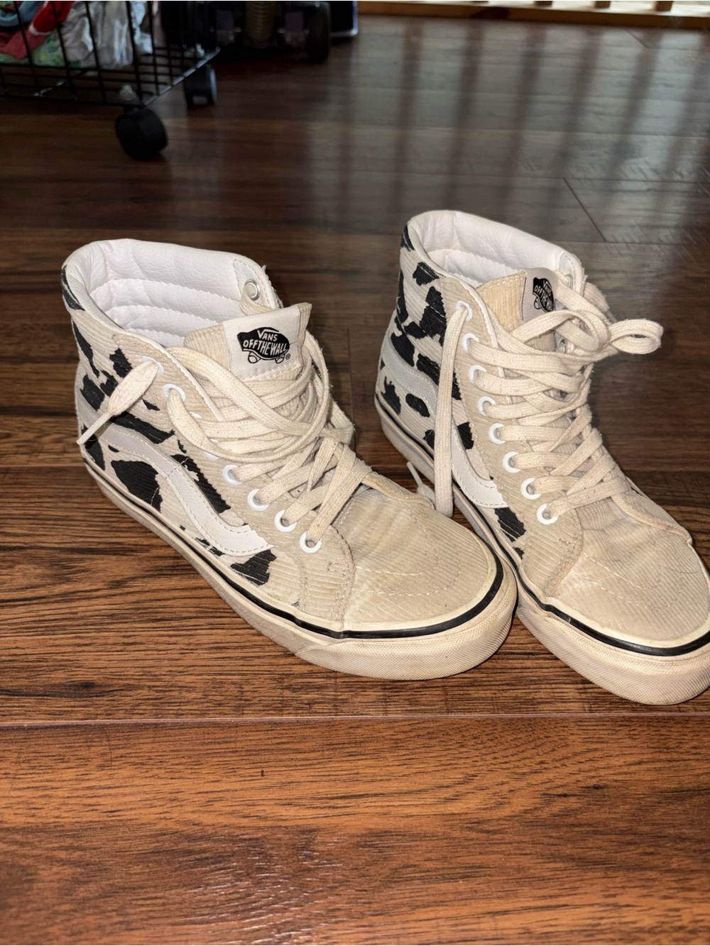 Vans High Top Sneakers in Cream with Black Cow Print